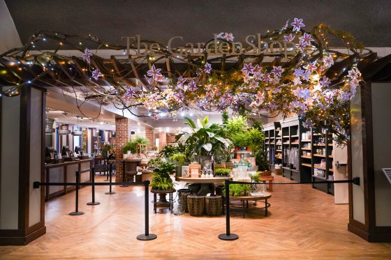 The Longwood Garden Shop with wisteria hanging over the entrance. 